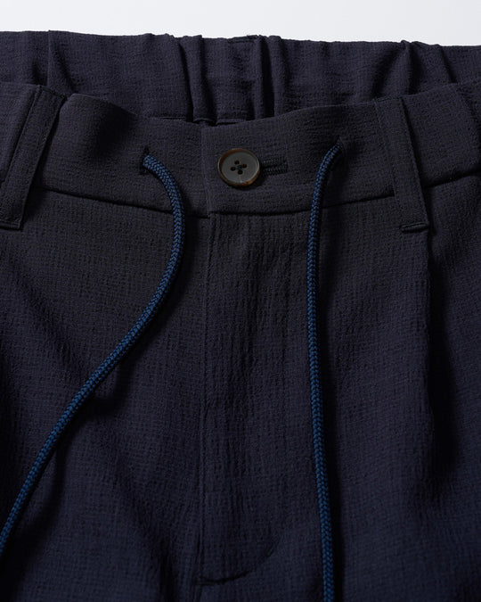 tuck slim slacks